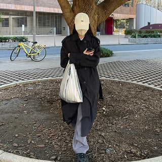 Oversized trench coat with sleeve belt