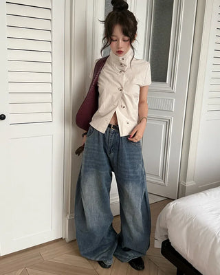 Cap-sleeve button-up high-neck blouse