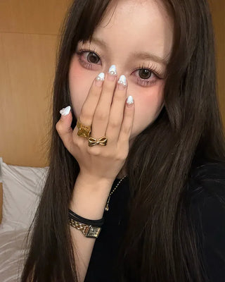 Ribbon motif ring