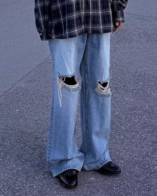 Distressed wide-leg denim