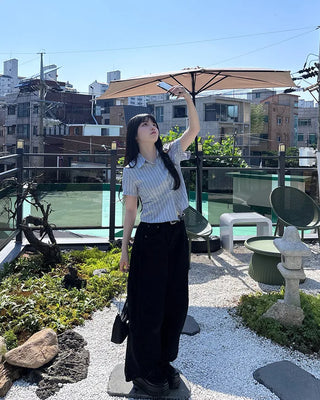 Balloon-fit pants with side pleats