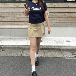 Belted mini skirt with side pockets