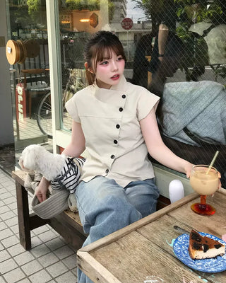 Slim, asymmetrical button blouse