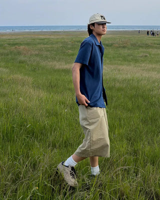 Cotton pleated Bermuda shorts