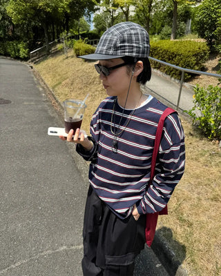 Checkered cap with drawstring