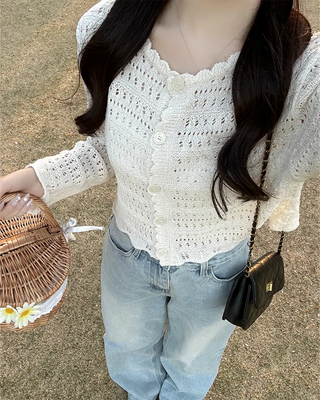 Wave punching cardigan