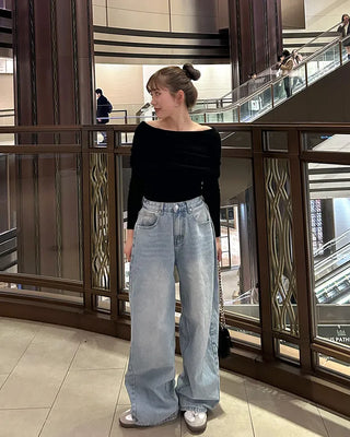 Wide-leg denim with side pleats