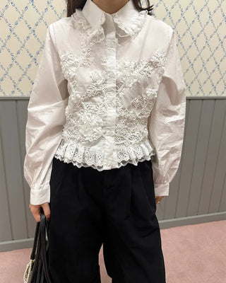 Flower embroidered peplum blouse
