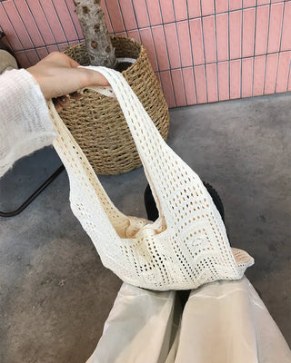Perforated knit shoulder bag