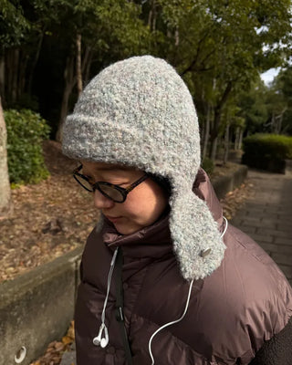 Knit hat with button ear flaps