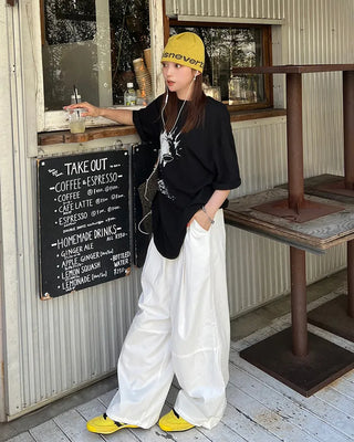 Cotton two-pleat wide-leg pants with key loop.