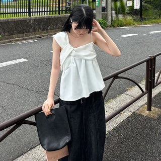 Asymmetrical design top