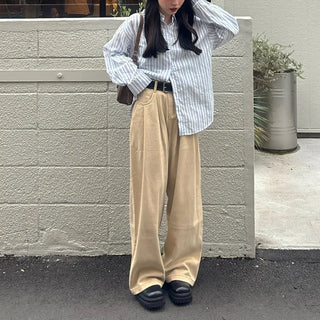 Tucked wide-leg pants