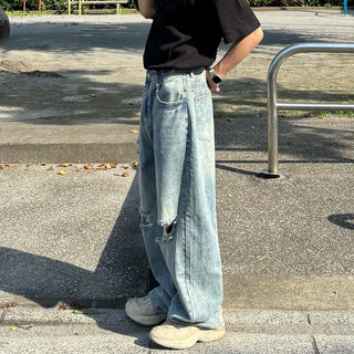 Distressed wide-leg denim pants