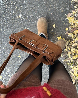 Suede buckle shoulder bag