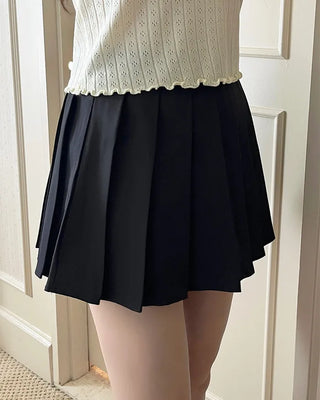 Belted pleated mini skirt