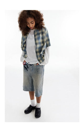 CONP Asymmetric bias-cut plaid shirt (blue)
