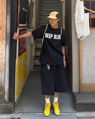Double-pleated Bermuda shorts
