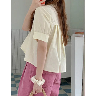 Feminine pleated blouse