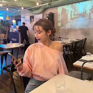 Off-shoulder cropped sweatshirt