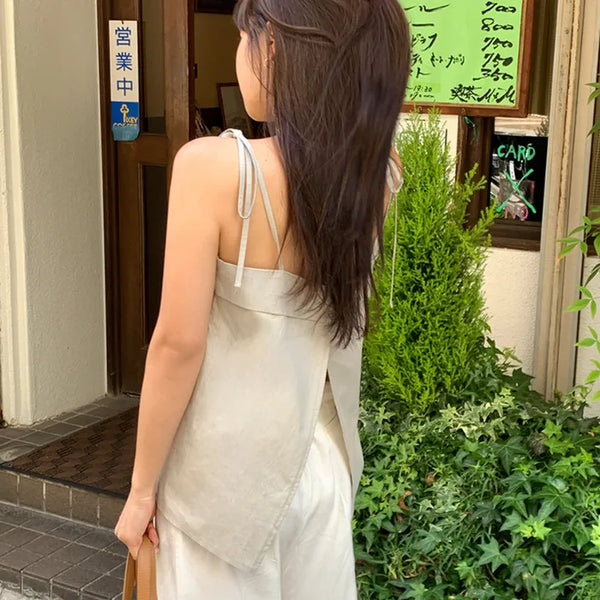 Ribbon back slit camisole blouse