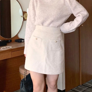 Pearl pocket mini skirt