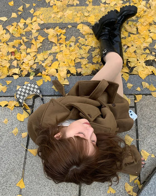 Trench-style mid-length jacket