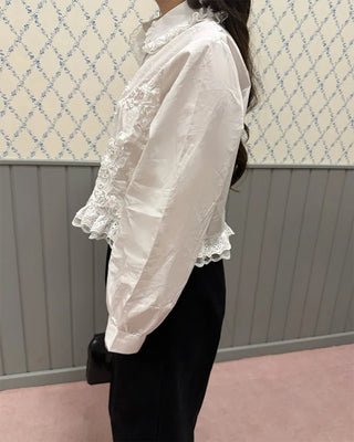 Flower embroidered peplum blouse