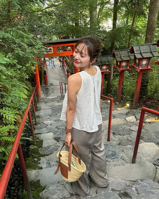 Sleeveless top with back slit