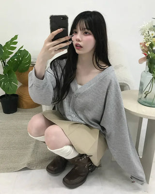 Three-button oversized cardigan