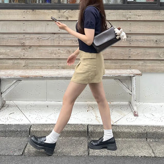 Belted mini skirt with side pockets