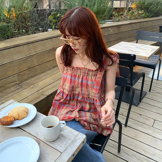 Checked sleeveless blouse