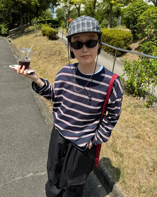 Checkered cap with drawstring