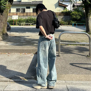 Distressed wide-leg denim pants