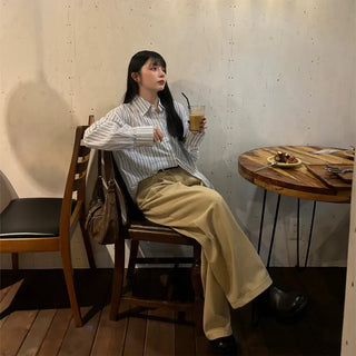 Tucked wide-leg pants