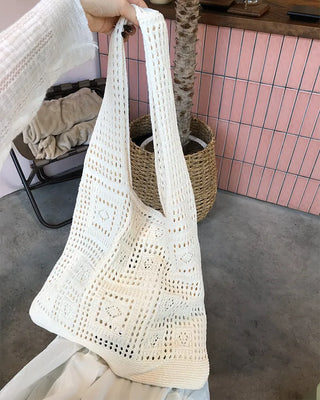 Perforated knit shoulder bag