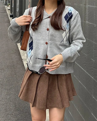 Belted corduroy pleated mini skirt