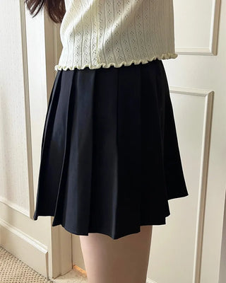 Belted pleated mini skirt