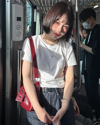 Square studded shoulder bag