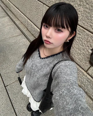 V-neck two-tone cable knit sweater