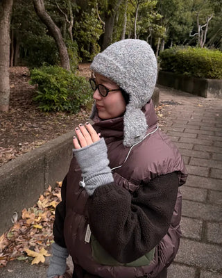 Knit hat with button ear flaps