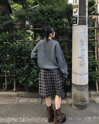 Checked pleated midi skirt
