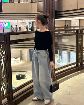 Wide-leg denim with side pleats