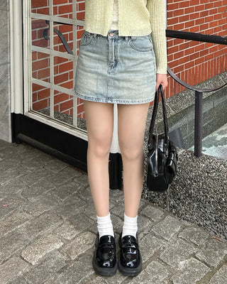 Washed denim mini skirt
