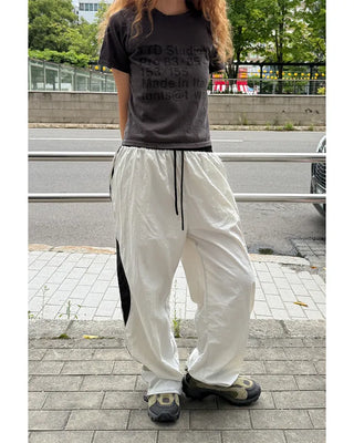 Side Round Point Windbreaker Pants