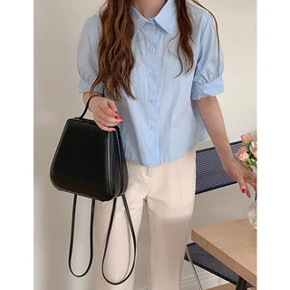 Feminine pleated blouse