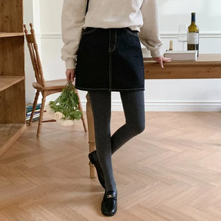 Low denim black mini skirt
