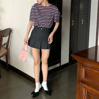 Pleated denim mini skirt