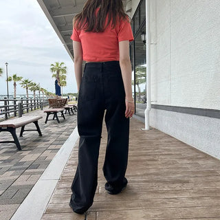 Distressed black denim pants