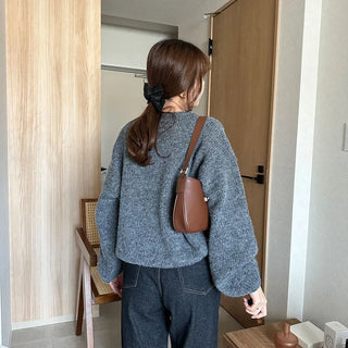 Loose-fitting button-up wool cardigan